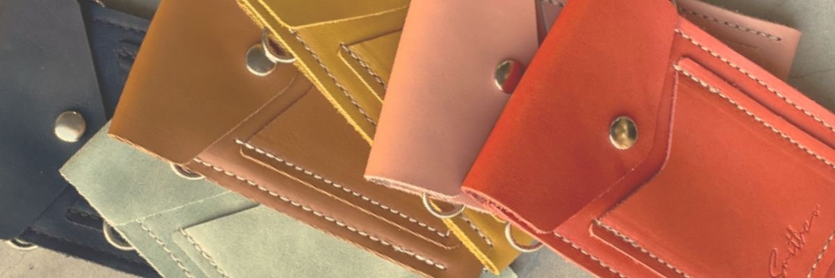 A collection of mini leather phone bags by Smithco Leather, Cape Town