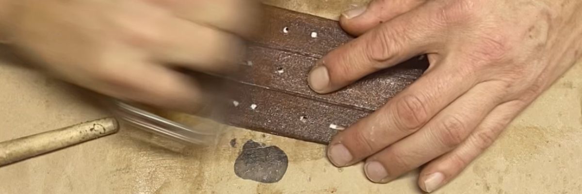 Cape Town artisan working on handmade leather straps for Smithco bags
