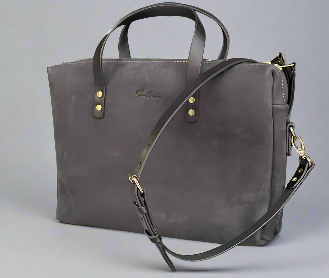 Compact black coloured leather laptop bag with shoulder strap and zip closure – Cape Town craftsmanship
for professionals, handmade in Cape Town