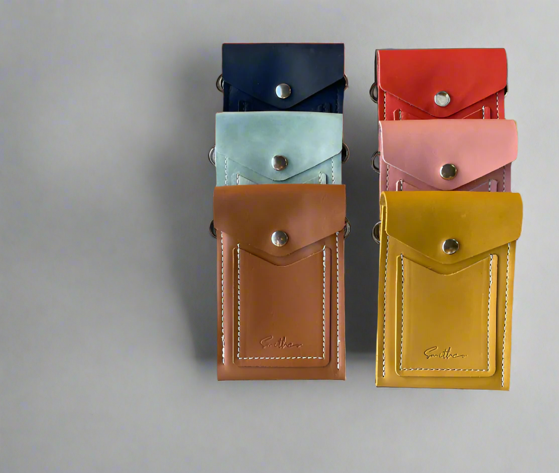 A collection of colourful Smithco Leather Essential Mini Bag – small structured leather bag for daily essentials