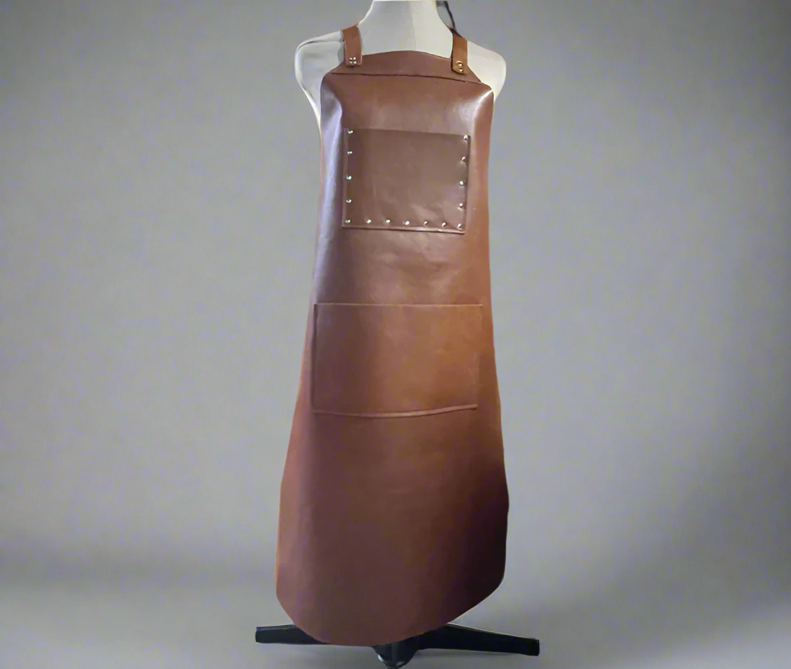Full grain leather apron with adjustable straps in tan – handcrafted for makers and creatives in Cape Town