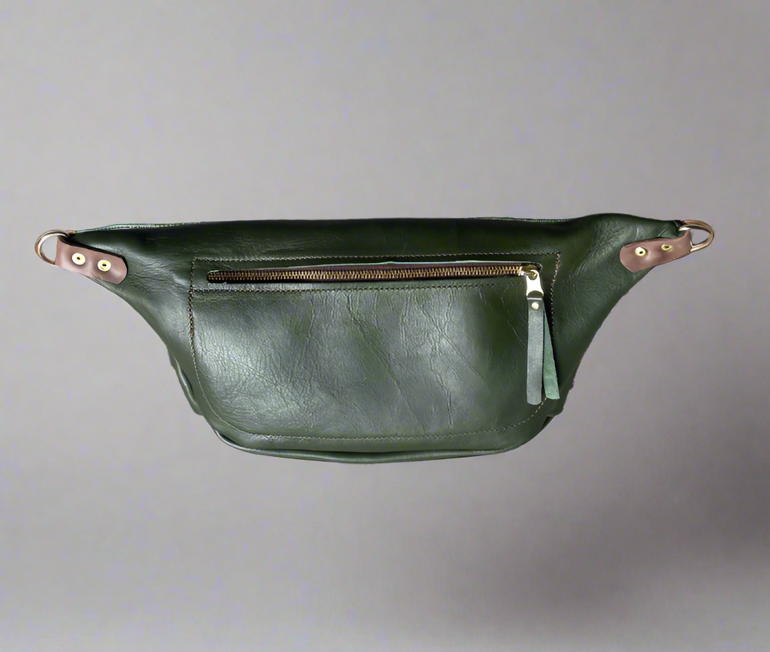 Back of green leather moonsling bag with large zipped pocket