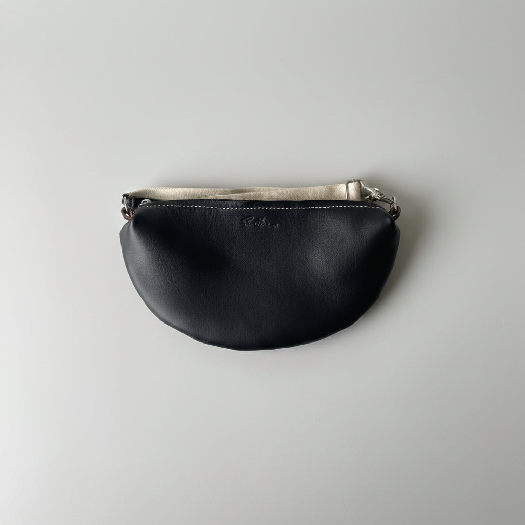 Halfmoon leather crossbody / sling bag