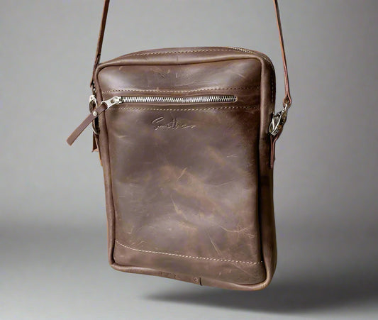 Unisex full grain brown leather crossbody sling bag with adjustable strap, handcrafted in Cape Town