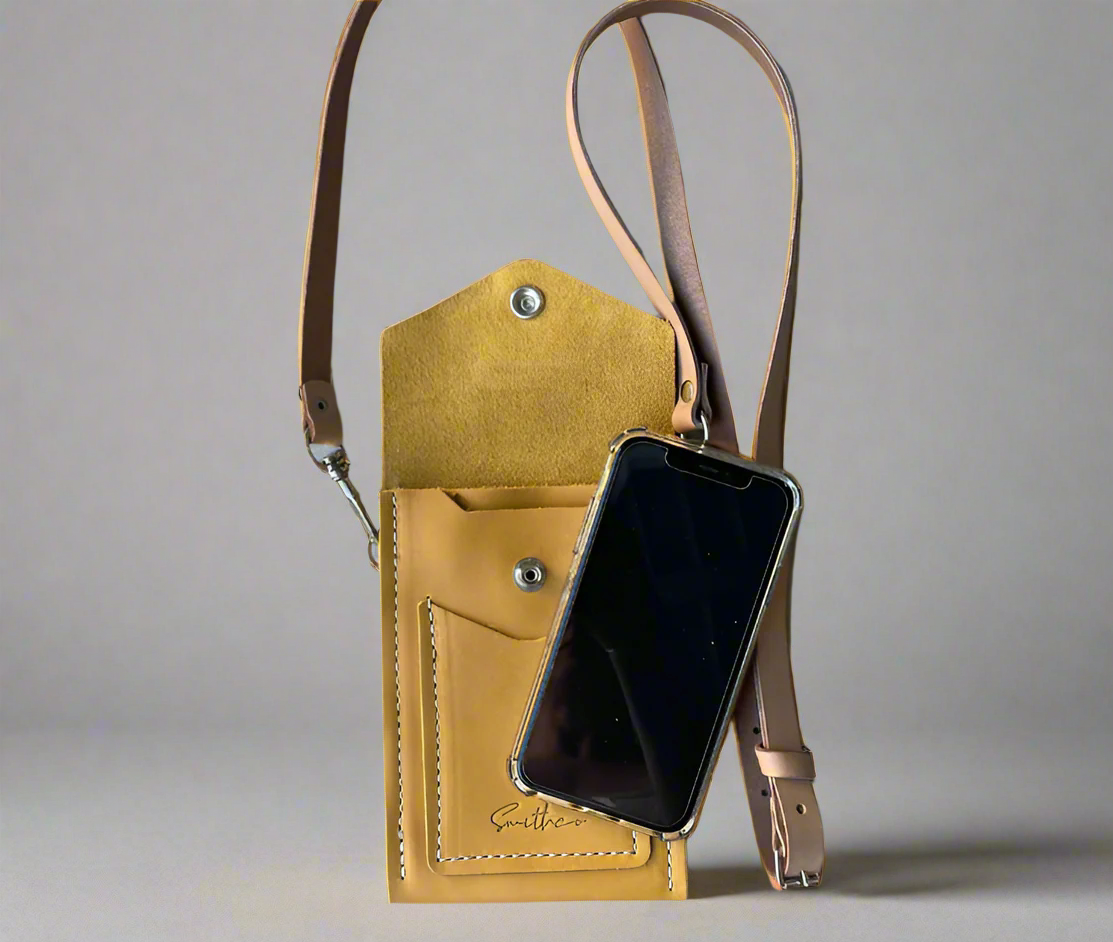 Smithco Leather Essential Mini Bag in ochre yellow with a phone for comparison – small structured leather bag for daily essentials