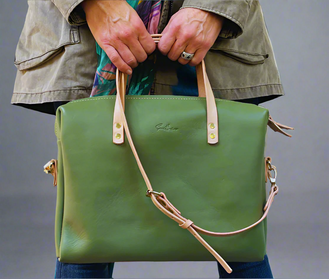 Compact full-grain sage green leather laptop bag – Handmade, durable, and stylish. Perfect for professionals on the go, featuring a sleek design with ample storage. Women-owned business.