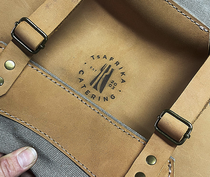 Close up of custom branded leather and canvas apron by Smithco Leather in Cape Town