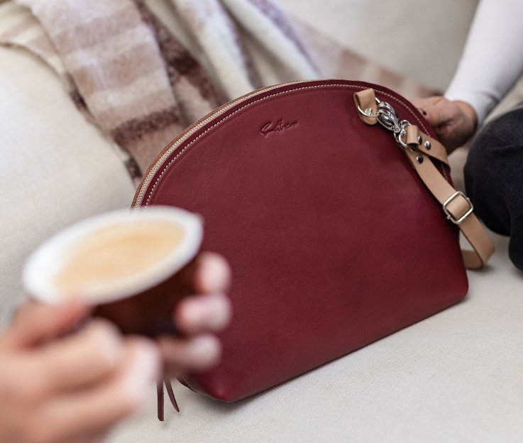 Arc gone large crossbody leather bag