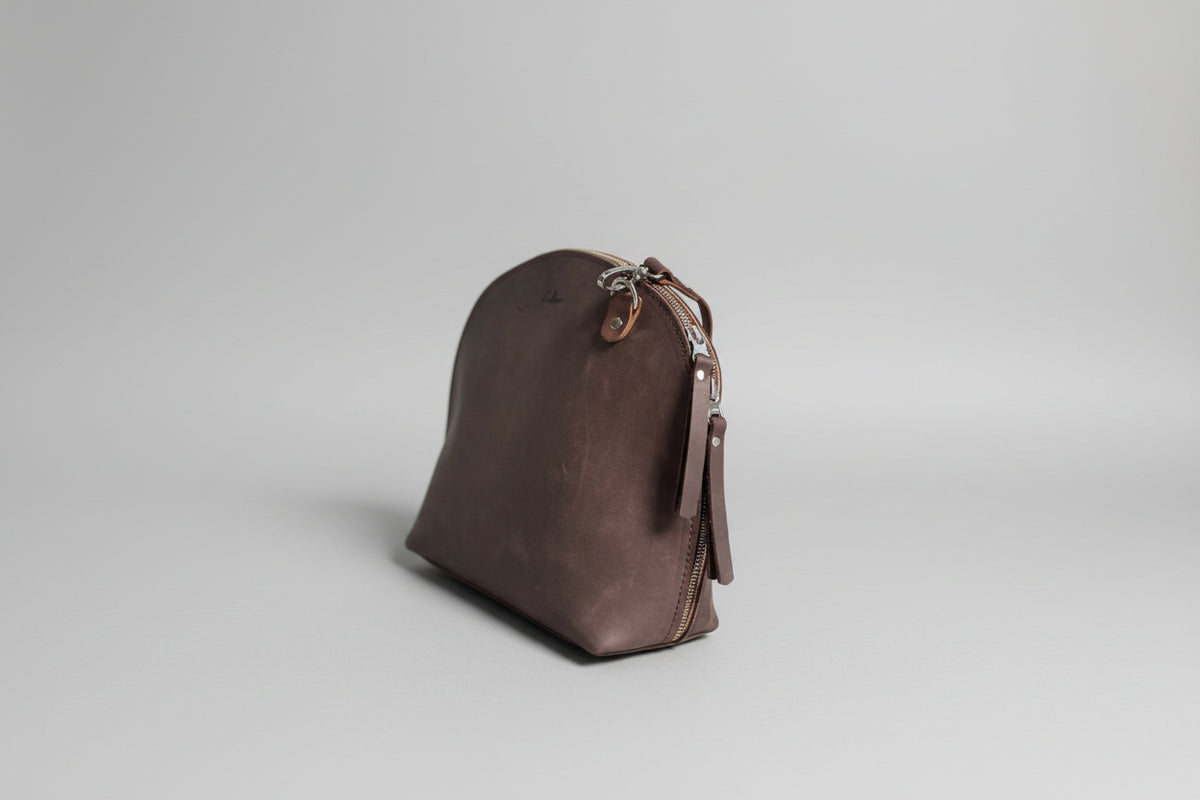 Arc shaped full grain leather crossbody bag handmade in Cape town by one maker
