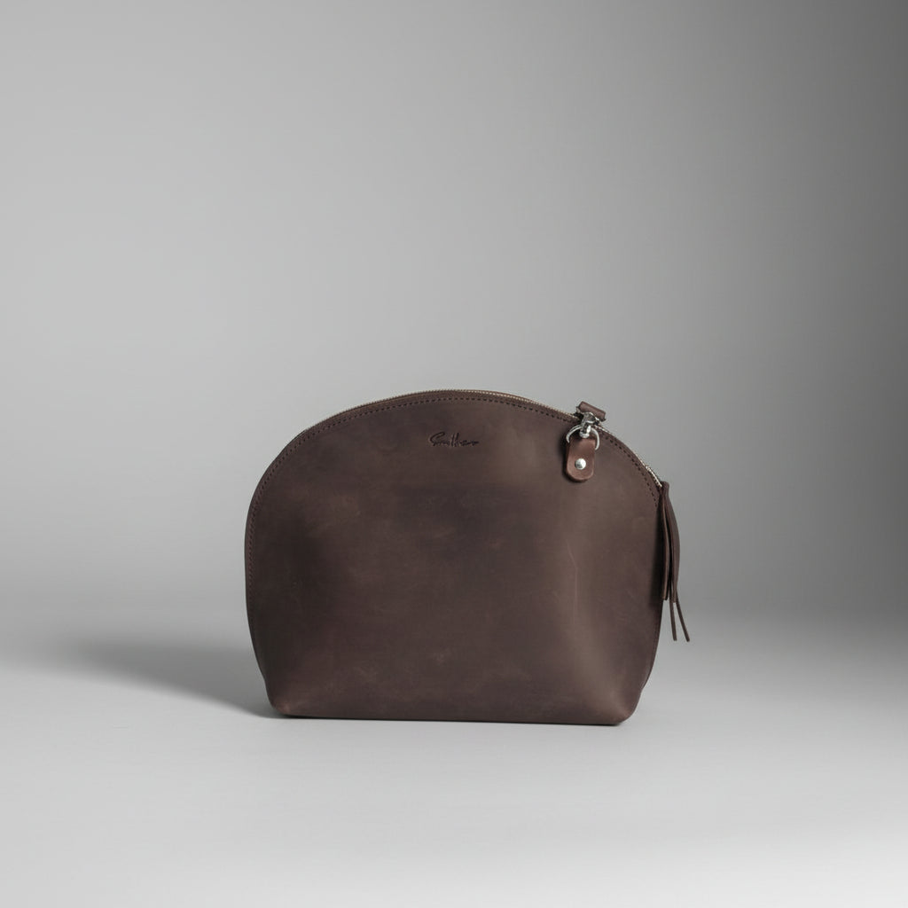 Arc shaped full grain leather crossbody bag handmade in Cape Town