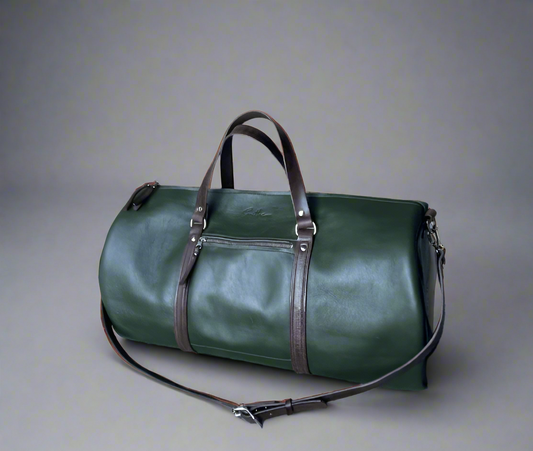 Spacious full grain leather weekend duffel bag in forest green with brown details, with sturdy handles and detachable strap, handmade in Cape Town