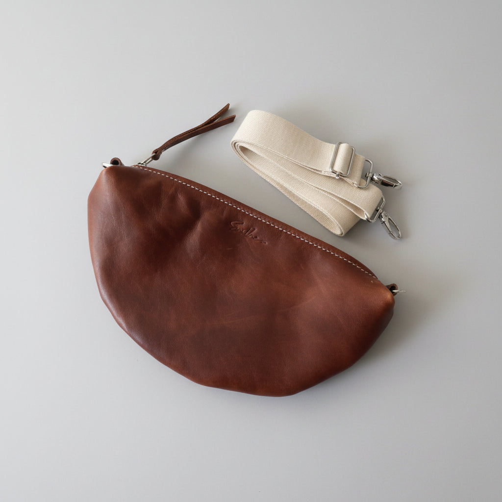 Halfmoon leather crossbody / sling bag